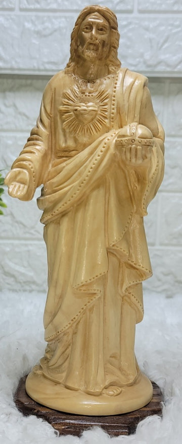 The Sacred Heart of Jesus: A Symbol of Compassion and Healing Olive wood Figure