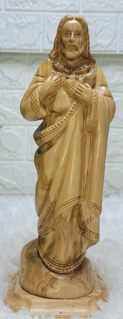 Olive Wood Jesus Figure placing his hands on his heart: A Symbol of Faith