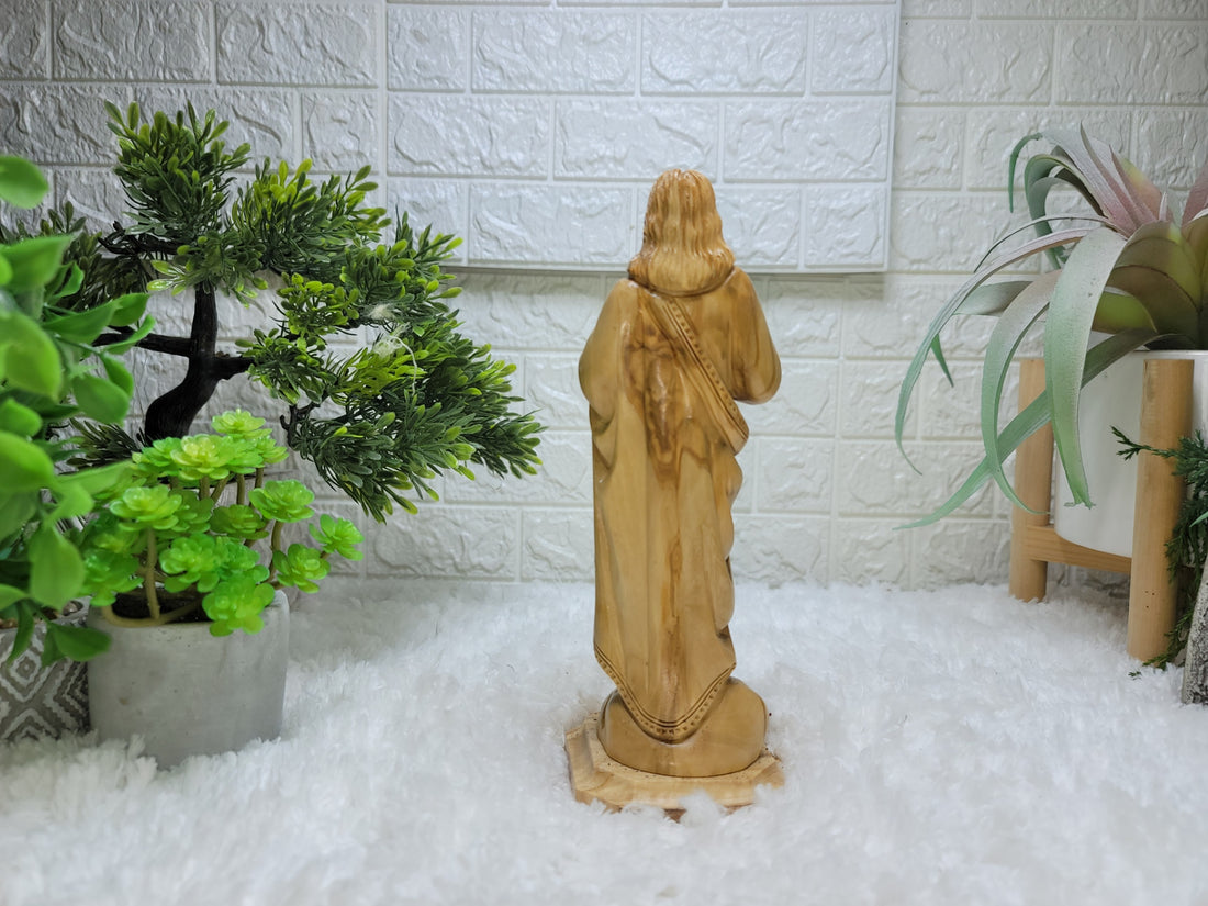 Olive Wood Jesus Figure placing his hands on his heart: A Symbol of Faith