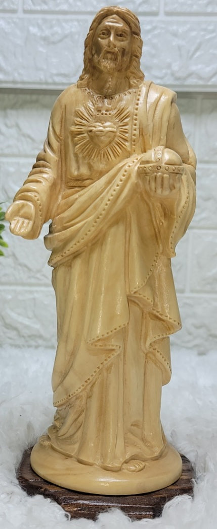 The Sacred Heart of Jesus: A Symbol of Compassion and Healing  Olive wood Figure