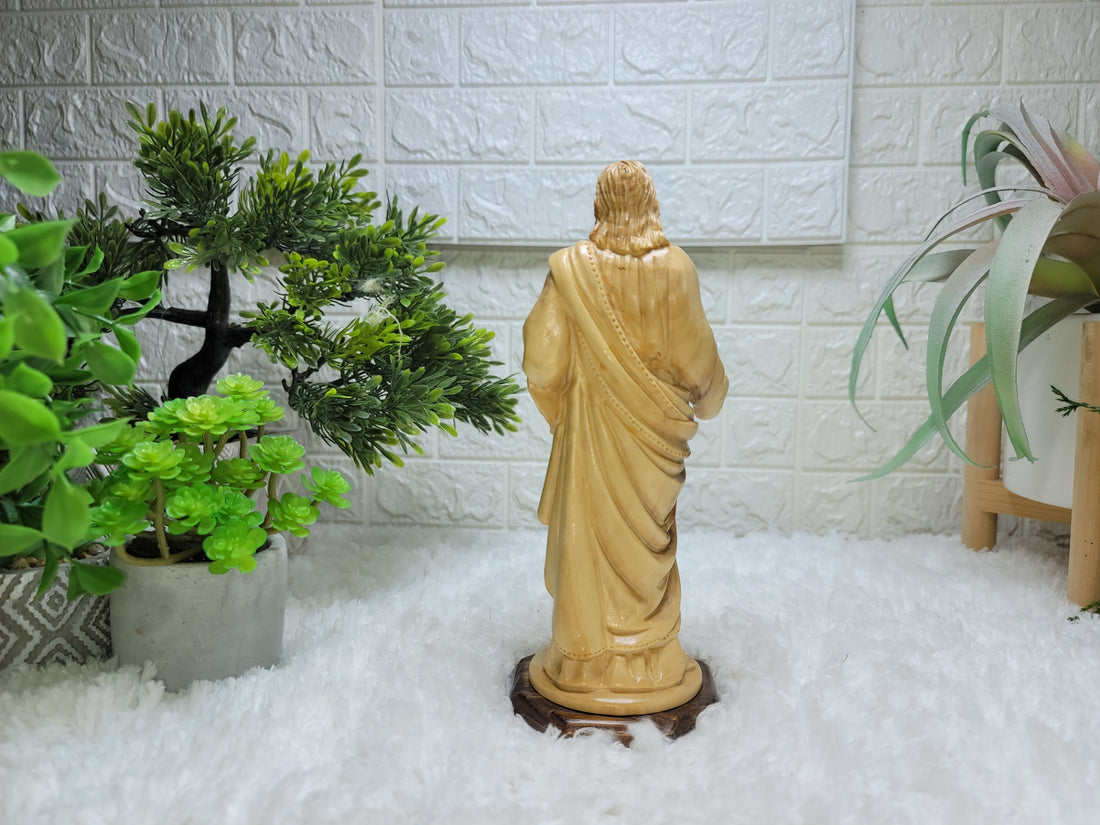 The Sacred Heart of Jesus: A Symbol of Compassion and Healing  Olive wood Figure