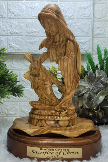 Virgin Mary with jesus holding the cross