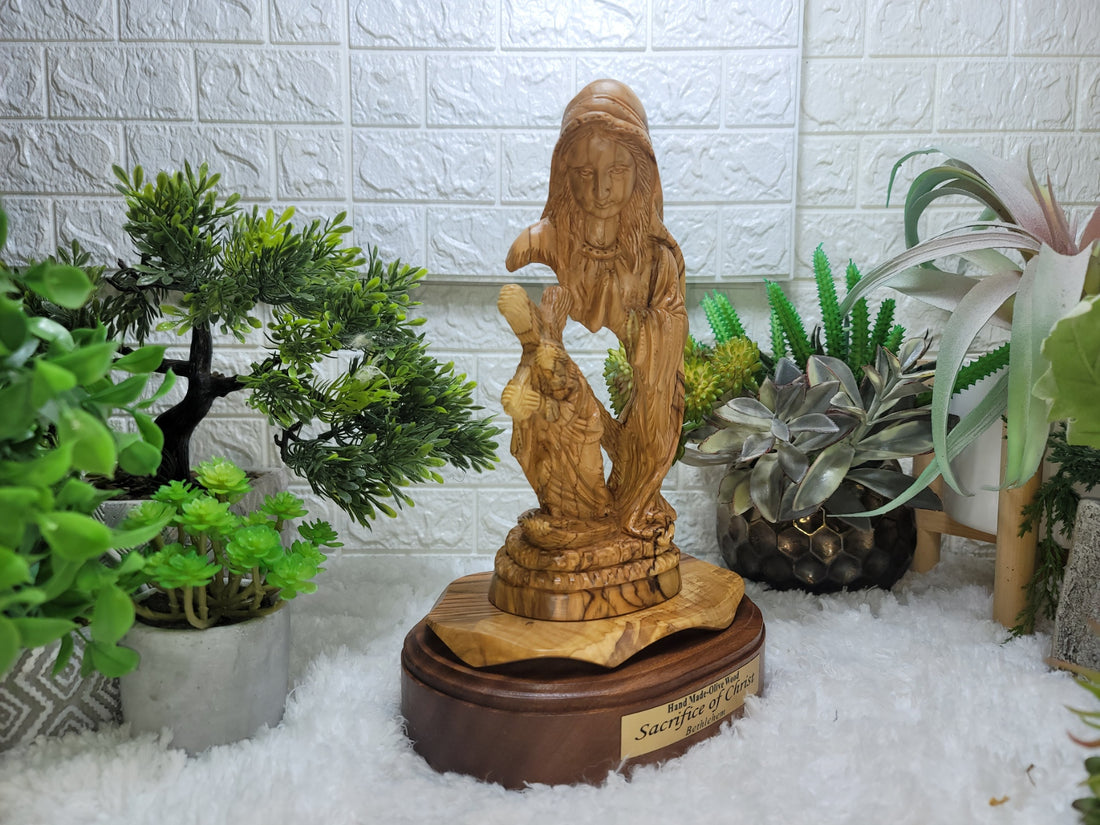 Virgin Mary with jesus holding the cross