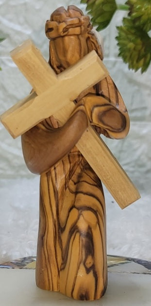 Jesus Holding the Cross: A Symbol of Faith olive wood figure