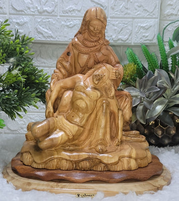 The Pieta olive wood figure A