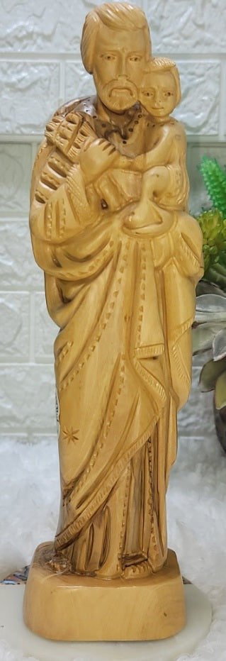 Saint Joseph Holding Baby Jesus