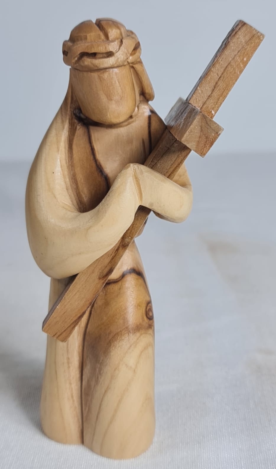 Jesus Holding the Cross: A Symbol of Faith olive wood figure